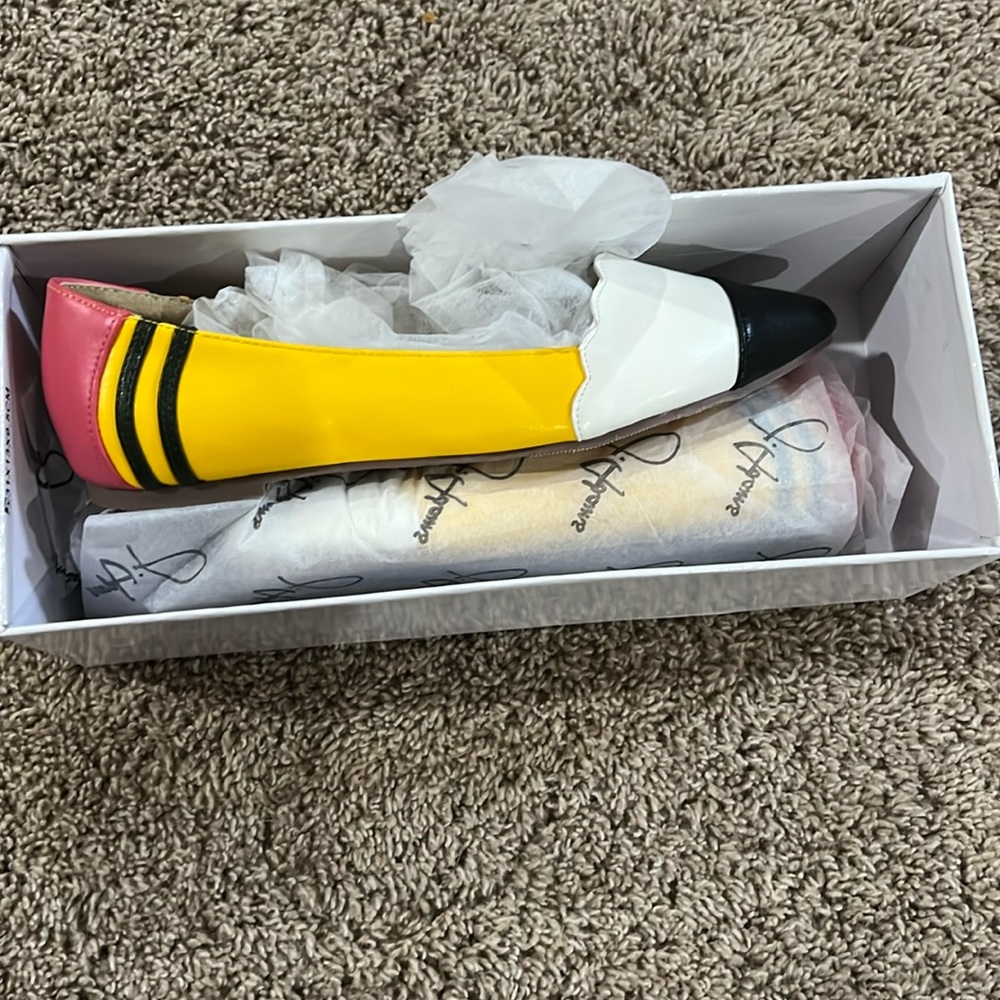 Brand new in the box. Size 7